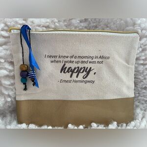 Cosmetic bag with quote